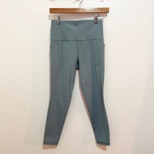 Athleta Salutation Stash Pocket II 7/8 Leggings Small Blue